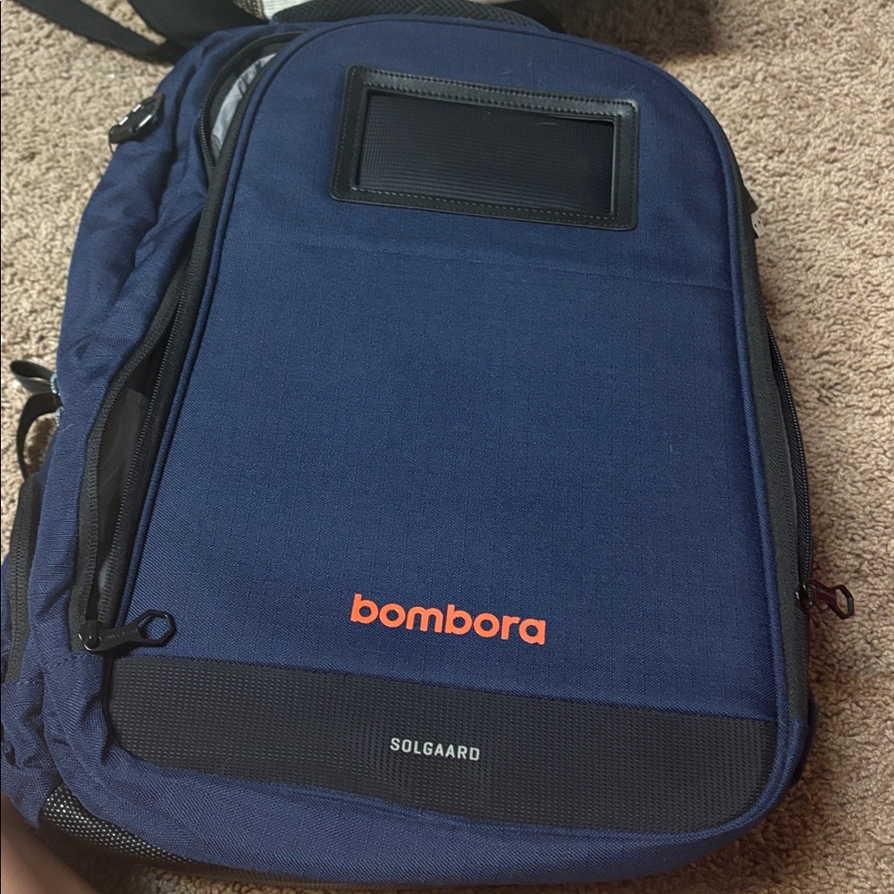 Solgaard Blue Backpack with Orange Logo